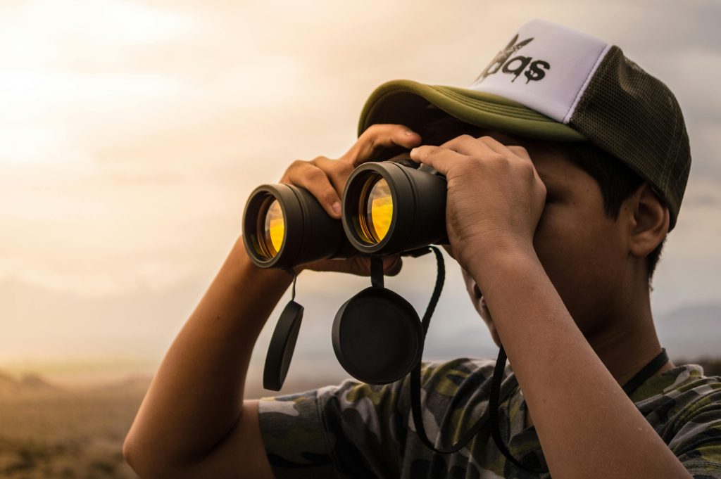 Man using binnoculars