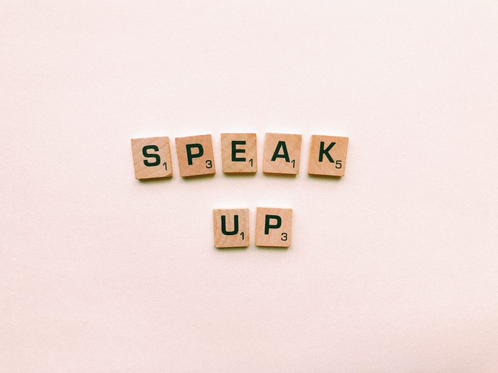 speak up trivial pursuit letters against pink background